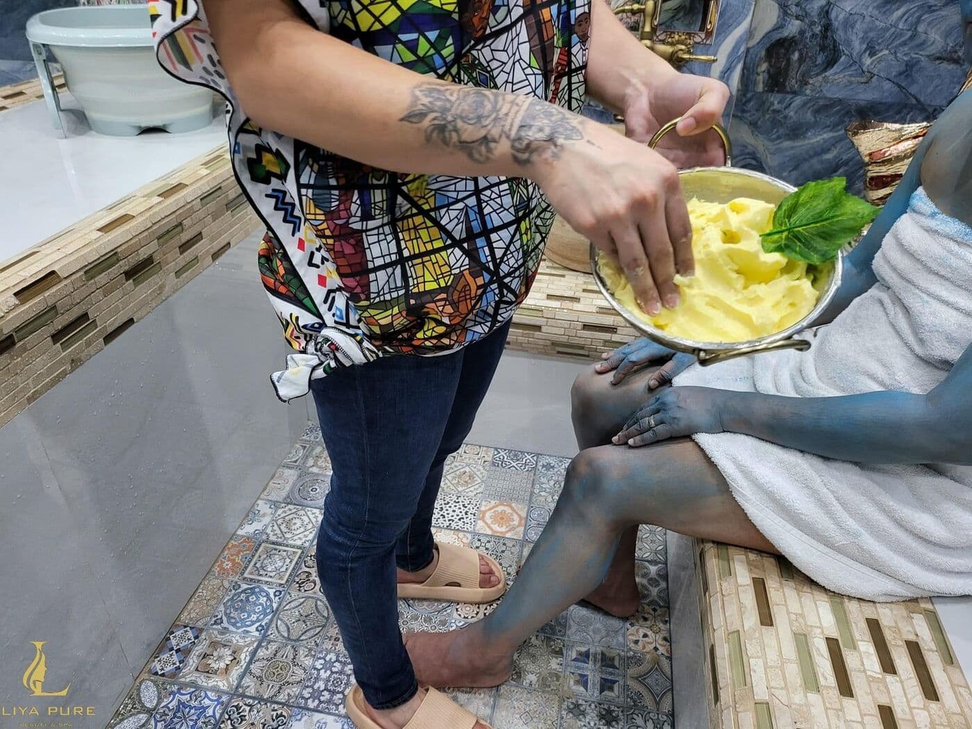 Guest with a fruit platter after treatment