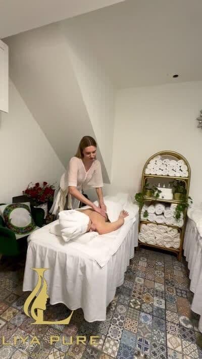 Relaxing massage on a treatment bed